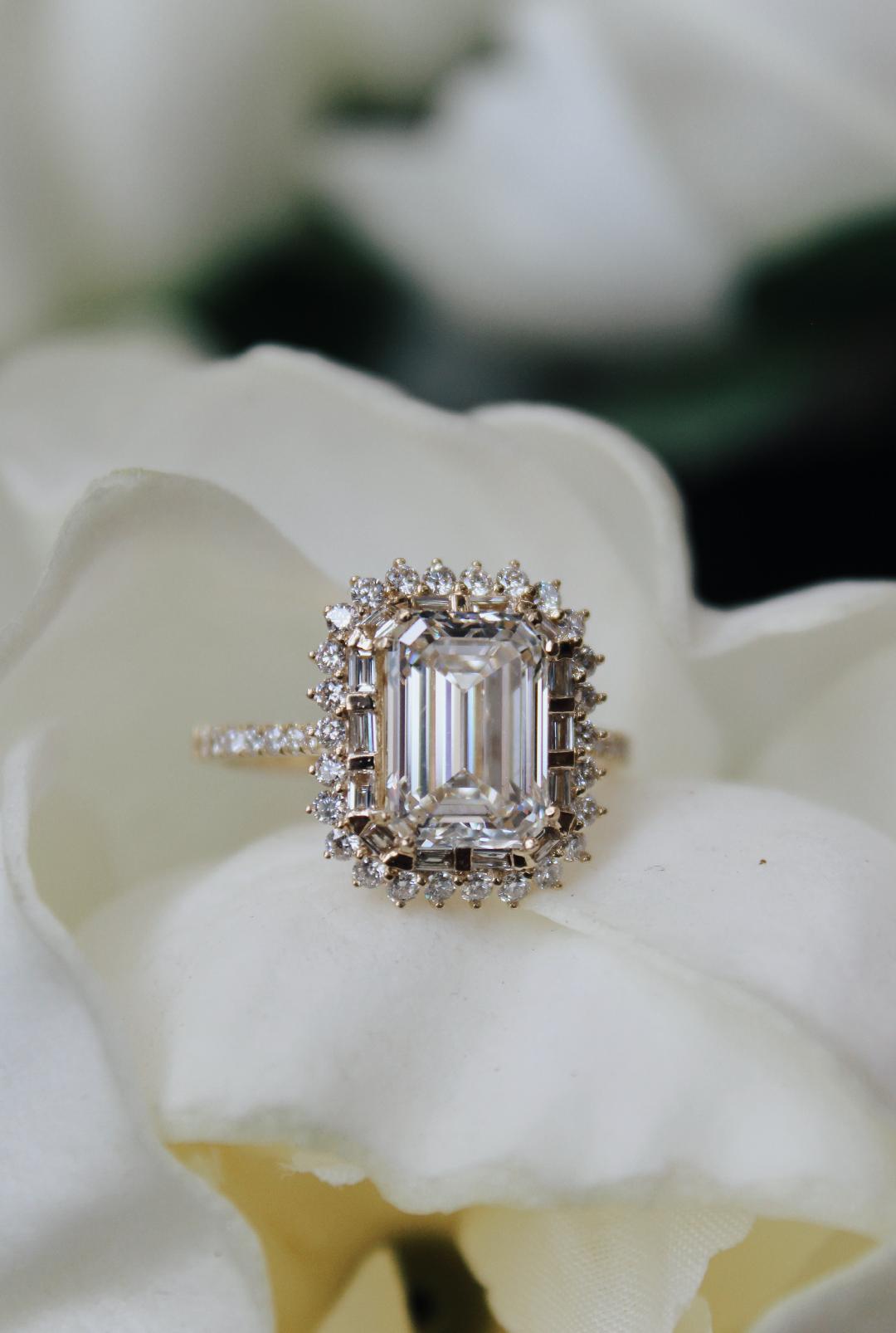 Yellow gold emerald cut engagement ring